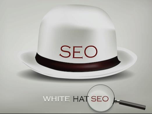 SEO on while hat with black ribbon around it