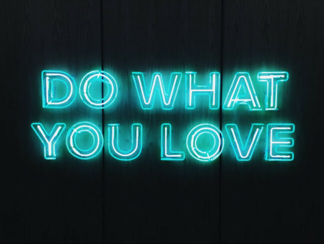 Black background with words in blue saying do what you love
