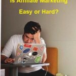 Man holding hand to head in front of Laptop wondering if affiliate marketing is easy or hard to do